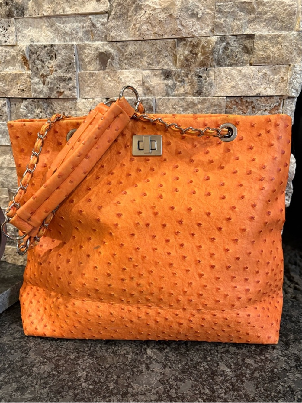 Orange Textured Faux Ostrich Leather Handbag from Amrita Singh
